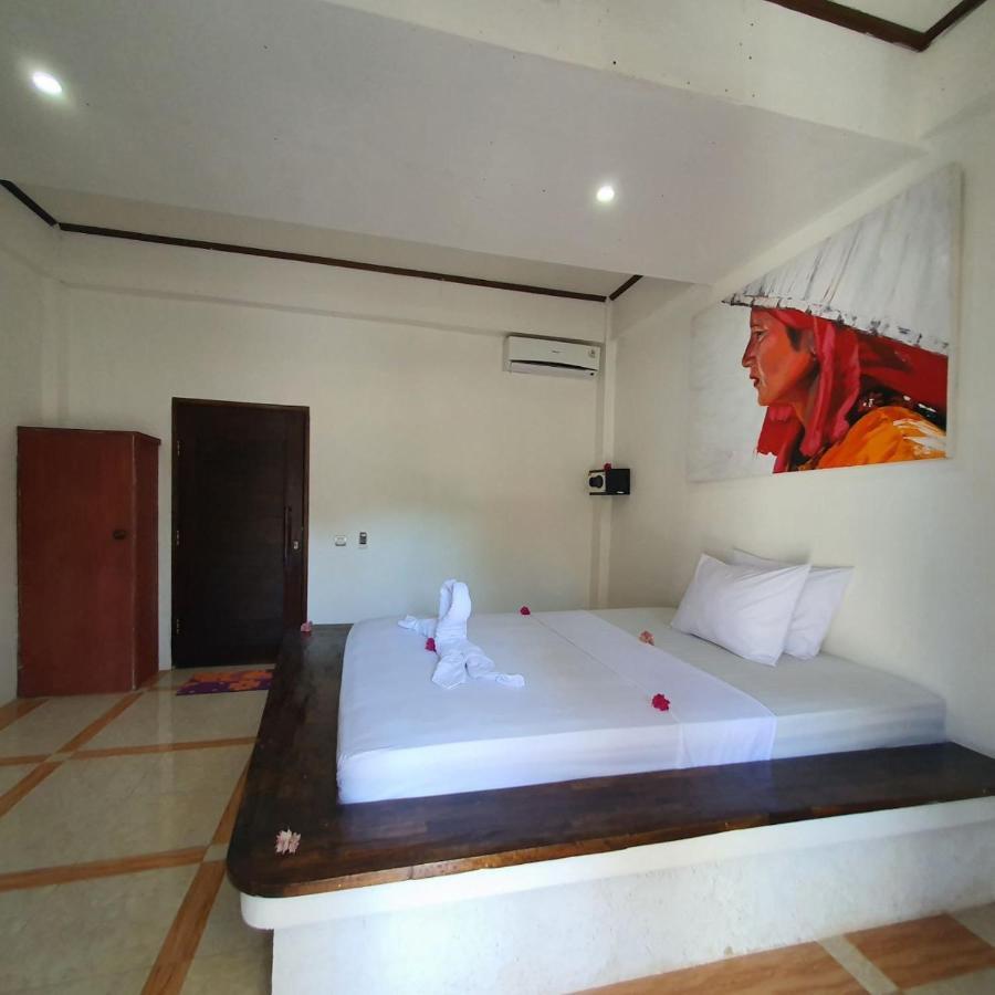 Putra Boyan Cottages Gili Trawangan Extérieur photo