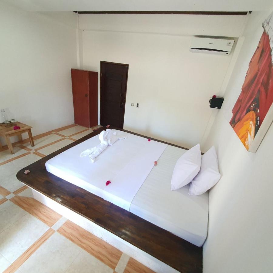Putra Boyan Cottages Gili Trawangan Extérieur photo